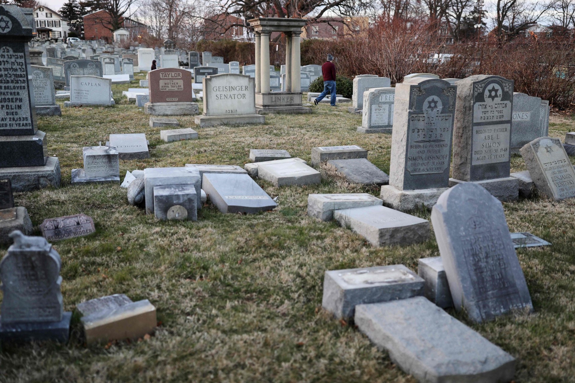 Hundreds of toppled Jewish gravestones in a Philadelphia cemetery after a vandalism attack